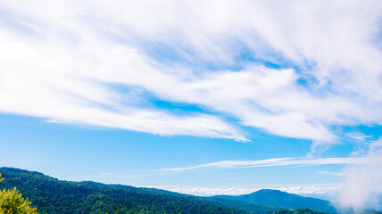Phu Thap Berk viewpoint. Mountain view from the top. Beautiful clouds and fog cover the mountains, traveling concept.