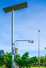 Security camera in the park powered by solar energy,Security of solar power plant.cctv cameras secure solar.