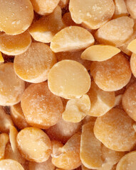 Close up of yellow dry peas as a background.