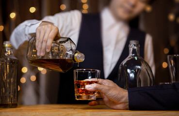 Bartender Serve Whiskey, on wood bar,