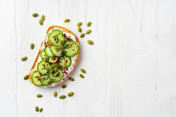 Healthy sandwich with cream cheese and cucumbers