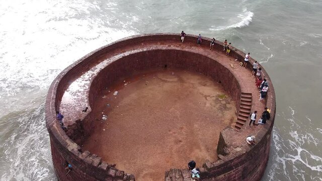 Aerial View of Aguada Fort, Sinquerim, Goa with waves crashing in the background