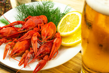 Boiled crayfish boiled ready to eat, wooden background.