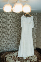 wedding dress on a hanger, White wedding dress, morning bride, wedding day, fitted wedding dress