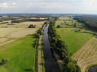 Aerial view of Havel river canal Voßkanal in Krewelin, Oberhavel, Ruppiner Lakeland, Brandenburg, Germany, section of famous Berlin-Copenhagen Cycle Route      