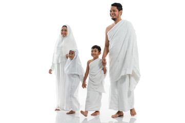 muslim hajj family and children walking and hold hand isolated over white background