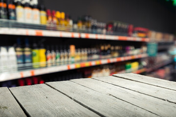 Empty wood table top on blurred market fruit. can montage or display your products