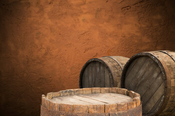 Wooden barrel on a table and textured background