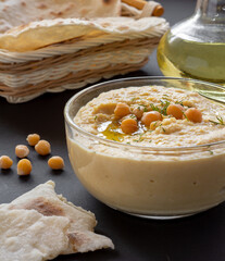 Chickpea hummus on a wooden table