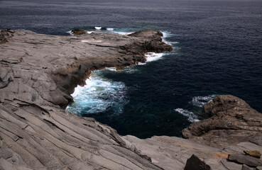 Obraz premium North coast of Gran Canaria, lava fields of Banaderos area, grey textured lava from eruption of Montana de Arucas 