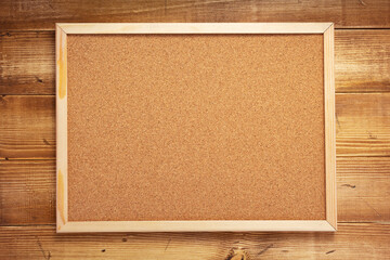 cork board on wooden background