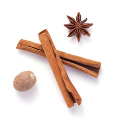 cinnamon stick, anise star and nutmeg on white background