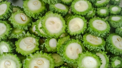 bitter gourd slices isolated on white