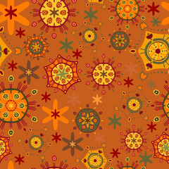 Summer abstract pattern. Seamless vector with different orange, yellow and green elements on orange background. Items scattered randomly. For textiles, fashionable prints, upholstery, children's