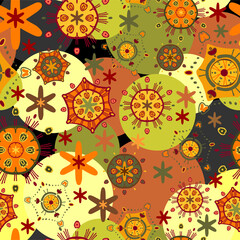 Summer abstract pattern. Seamless vector with different orange, yellow and green elements on the background of multicolored circles. Items scattered randomly. For textiles, fashionable prints