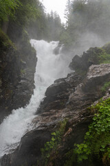 The "Riesachfälle" waterfall near Schaldming, Styria, Austria on a rainy day,  Wilde Wasser, Untertal, Rohrmoos