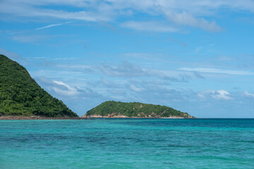 Fototapeta premium Beautiful backgrounds of quiet clear clean water sea white sand beach in summer holiday in Koh Kham Thailand Chonburi with local speed ferry boat