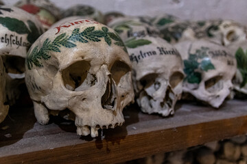 Skulls in ossuary, Karner St. Michael's Chapel, Lake Hallstatt, Salzkammergut, a UNESCO World Heritage Hallstatt-Dachstein Salzkammergut, Upper Austria, Austria, Europe, 17. June 2020