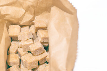 Brown sugar  in cubes, packed in paper