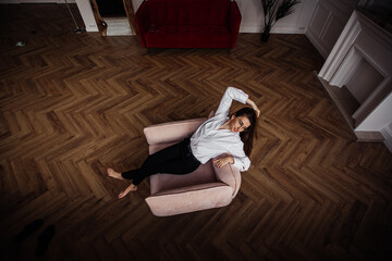 young woman sitting on a chair
