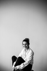 Portrait of a girl sitting on a chair