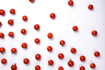 Naklejka na ściany i meble Ripe red tomatoes isolated on white background.