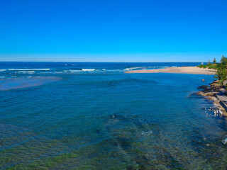 Drone Aerial view of The Entrance NSW Australia blue bay waters great beach and sandy bars