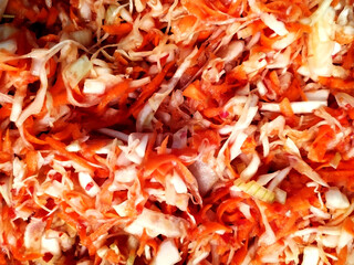 Mixed salad cabbage, carrot, tomato, bell pepper. Mixed. Background texture. View from above. Copy space