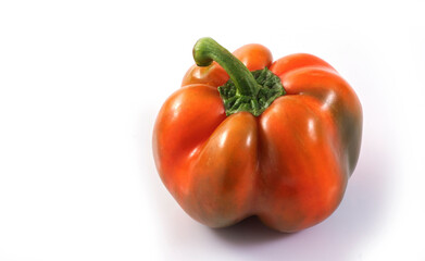 Fresh one red capsicum annuum or sweet chili or bell pepper isolated on white background with clipping path. Vegetarian or healthy food concept.