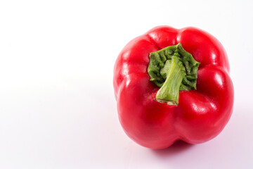 Fresh one red capsicum annuum or sweet chili or bell pepper isolated on white background with clipping path. Vegetarian or healthy food concept.