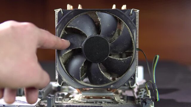 Demonstration of dust pollution. Dirty cooler and CPU heatsink from dust. 4k.