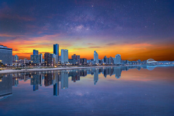 Durban beachfront skylines after sunset with stars in the sky