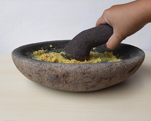 Mashed seasoning, from garlic, candlenut, salt and pepper. Handmade, traditionally made with stone...