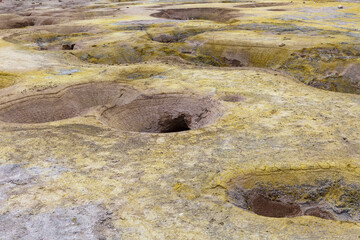 Holes in the volcanic crater. Nisyros, Greece.