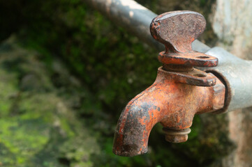 Old rusty metal tap