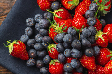 Close up photo of blueberries and strawberries