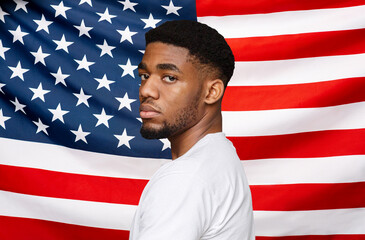 Black Lives Matter. Serious African American Man Posing Over USA Flag Background