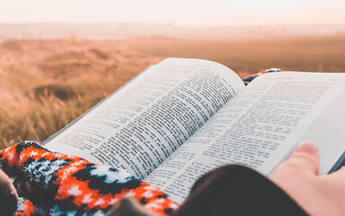 girl reads the bible 