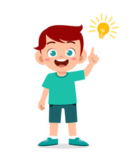 happy cute little kid boy with idea lamp sign