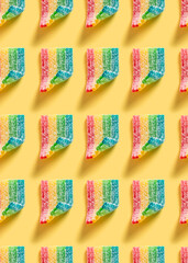 sugar gummy candy seamless pattern on a yellow background