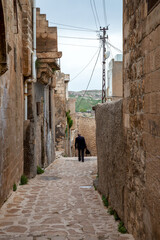 View of the narrow streets of the historic Mardin. Mardin, Turkey.