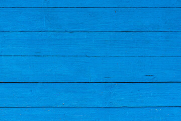 old boards painted with blue paint