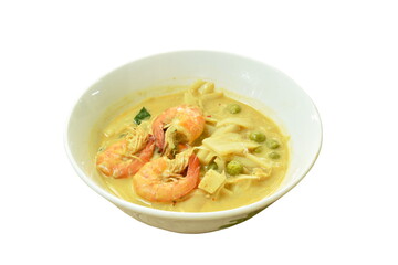 spicy boiled slice pickled bamboo shoot with shrimp and eggplant in coconut milk curry soup on bowl