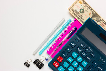 Financial or accounting background with place for text. Calculator, office supplies, 10 dollars