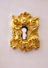 golden pad over the lock and keyhole