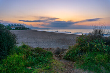 Fototapeta na wymiar Sunrise on a beach in Benicassim, Costa azahar
