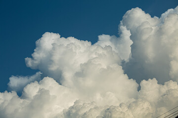 Naklejka na ściany i meble Beautiful big cloud on the sky wallpaper