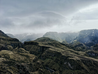 clouds over the mountains and canyon