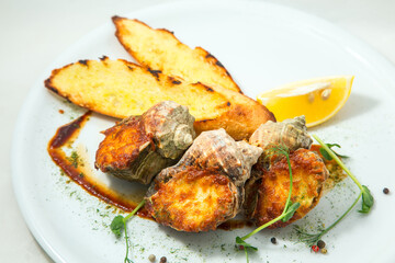 grilled snail breast with potatoes
