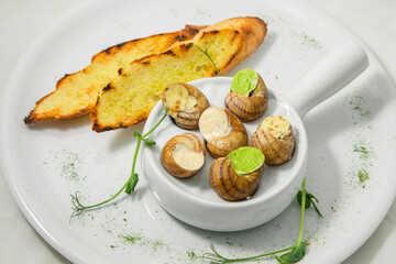 grilled snail breast with potatoes
